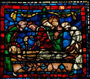 Grablegung, Glasmalerei um 1150, Westfenster Kathedrale zu Chatres.